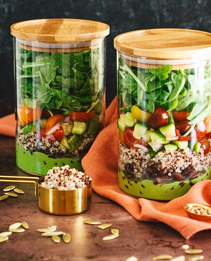 Meal Prep Quinoa, Black Bean, Arugula Bowl with an Herby Poblano Green Dressing