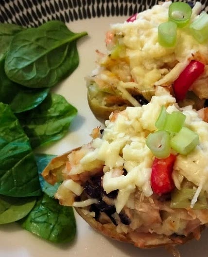 Cheesy salmon and leek stuffed potato skins
