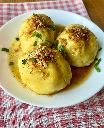 German Potato dumplings with herb butter 
