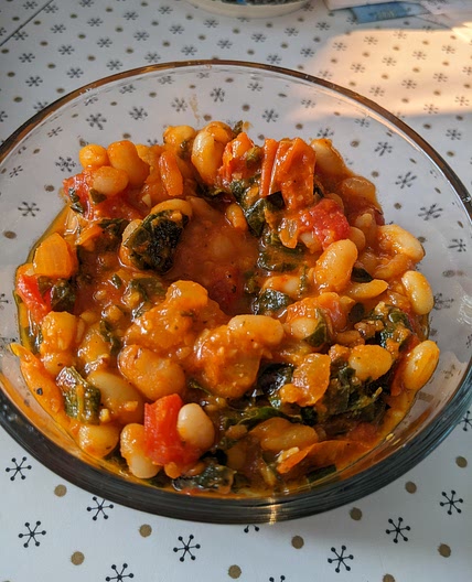Saucy beans - white beans, tomato, swiss chard