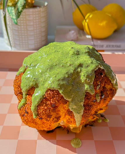 Whole Roasted Cauliflower with Green Tahini Sauce