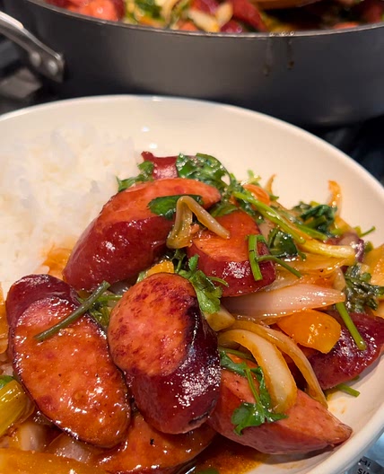 Stir fried kielbasa with steamed rice