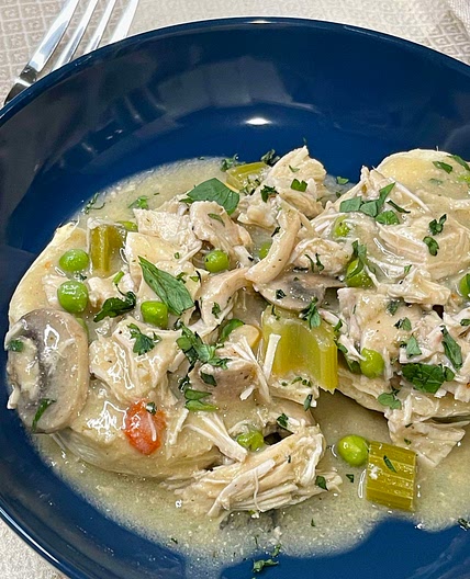 Crock Pot Chicken a la King over biscuits 