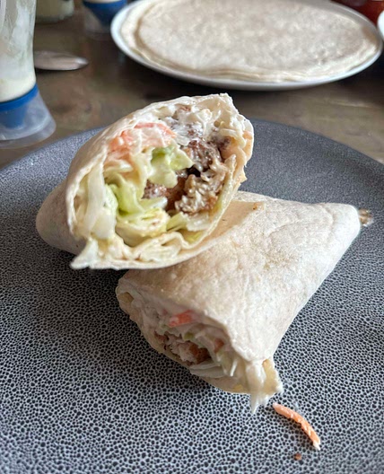 Popcorn Chicken Wrap with Sriracha/Sweet Chilli & Slaw