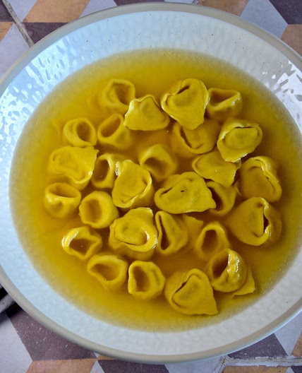 Chicken cappelletti in chicken stock (in brodo)