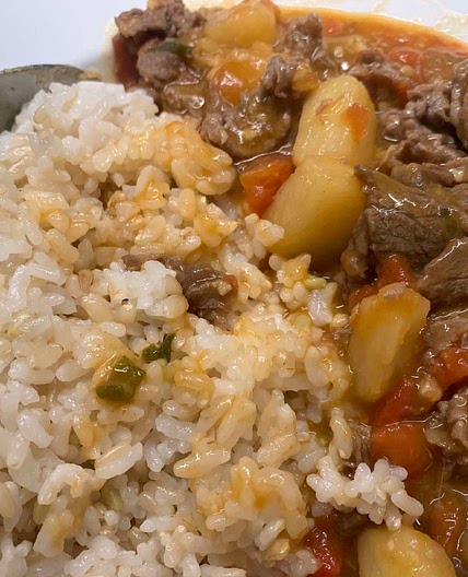 Shaved beef rice with tomato and potato