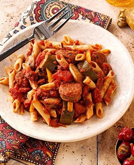 Pasta with marinara sauce and Italian sausage