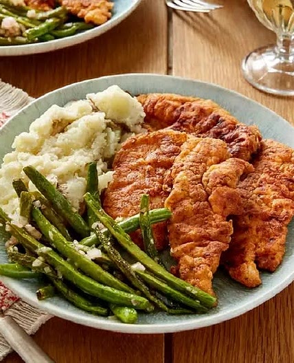 Thanksgiving Creamy Mashed Potatoes with a side of Nashville Hot Chicken recipe by Christopher West