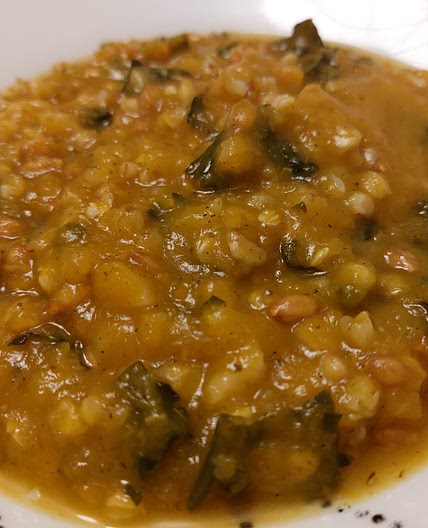 Pumpkin soup, black cabbage and chestnuts
