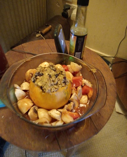 Stuffed pumpkin with veg in tomato sauce