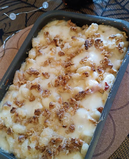 Gnocchi al forno con Gorgonzola, pancetta, noci e provola