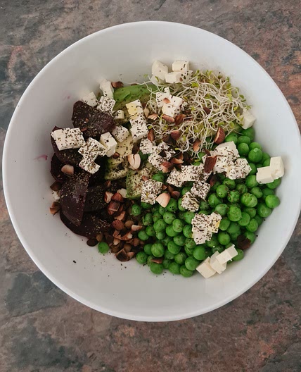 Beetroot, avocado and pea lentil bowl