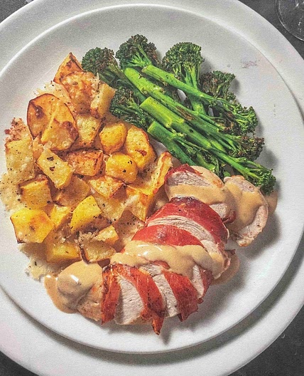 Ham wrapped chicken w/ cheesy truffled potatoes 