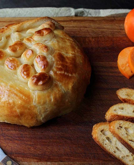 Baked Stuffed Brie with Cranberries & Walnuts