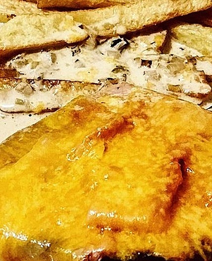 Überbackenes Schweinerückensteak in Sahnesauce