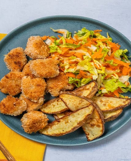 Vegan Crispy Chicken Bites mit Kartoffelspalten Bei diesem Gericht wird 50% weniger CO2e durch Zutaten verursacht als bei einem durchschnittlichen HelloFresh Rezept
