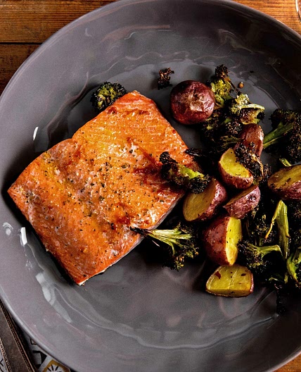 Pan fried salmon with boiled broccoli and potatoes