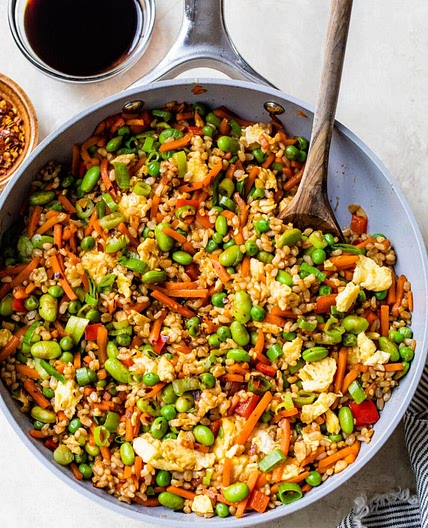 Egg fried rice with chicken and red bell pepper