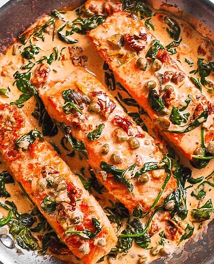 Cream Tuscan Salmon with Spinach and Artichoke Hearts