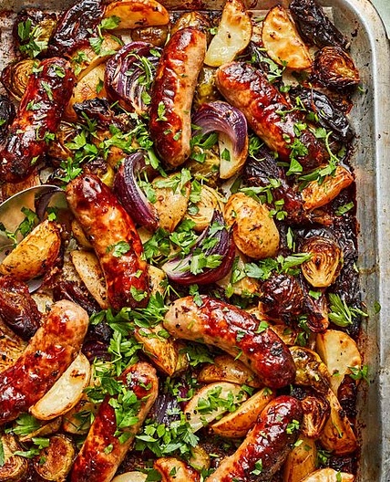Sticky date and sausage traybake