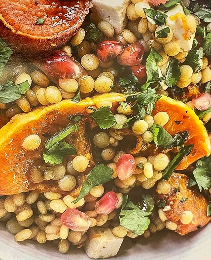 Giant couscous with roasted winter vegetables & pomegranate mol 