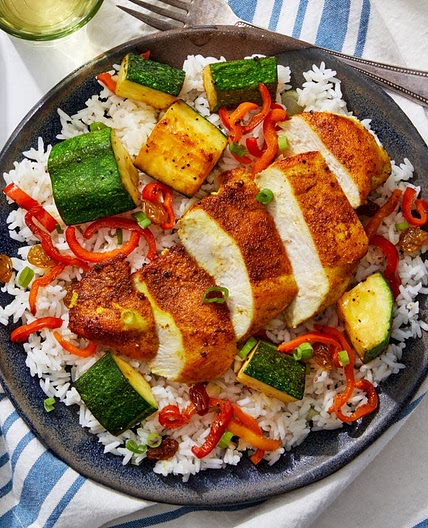 To elevate our fragrant Vadouvan-coated chicken breasts, we’re serving a sweet-and-spicy dipping sauce made from honey and spice