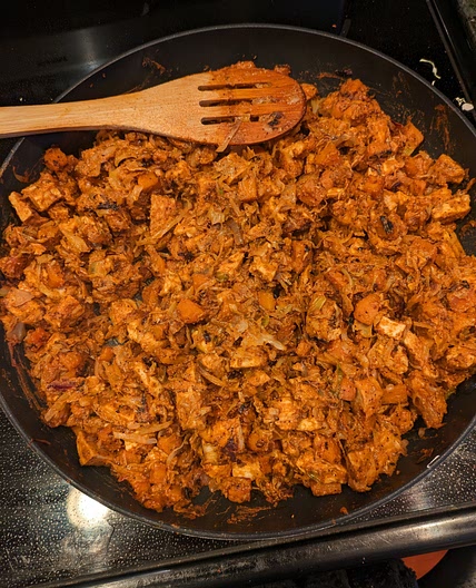 Chicken and Cabbage over a Peanut Chili Sauce