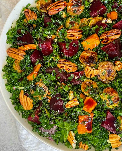 Kale Salad with Honeynut Squash, Brussels Sprouts, and beets.  