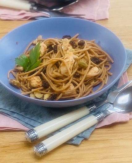 Chicken Spaghetti Recipe with olives, sun-dried tomatoes, raisins and almonds