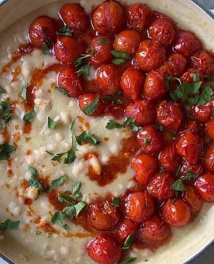 Harissa roasted cherry tomatoes, juicy and bursting with flavour