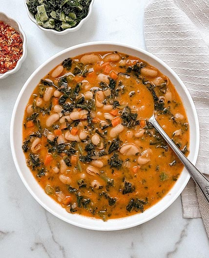 Simmering up a cozy hug in a bowl with this creamy white bean so