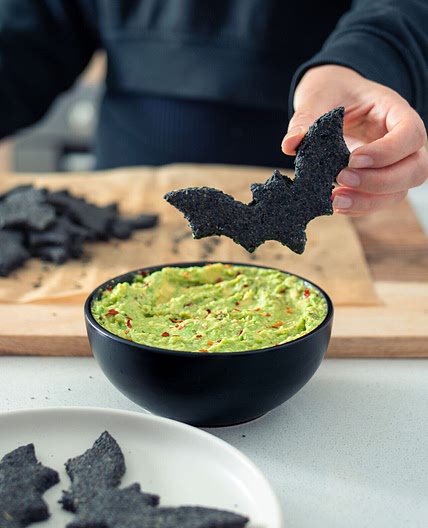 Bat-Shaped Halloween Crackers with Guacamole