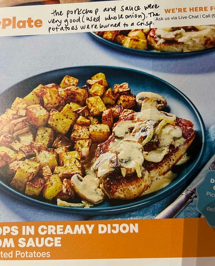 Pork chops in creamy Dijon mushroom sauce