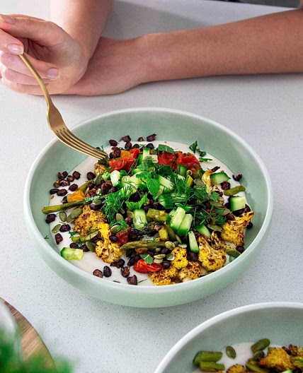Roasted Cauliflower Bowl with Creamy Garlic Sauce