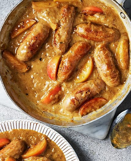 Sausages with apple and onion gravy