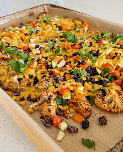 CAULIFLOWER VEGGIE PACKED NACHOS WITH A HOMEMADE VEGAN CHEESE SAUCE