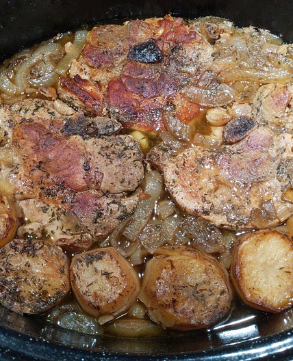 Braised Pork Chops and Fondant Potatoes with Onions in Sauce