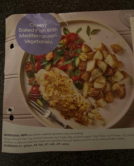 Cheesy baked fish with Mediterranean vegetables 