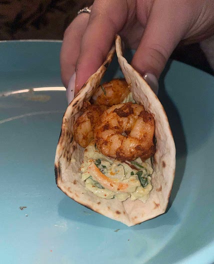 Shrimp tacos with a creamy avocado slaw
