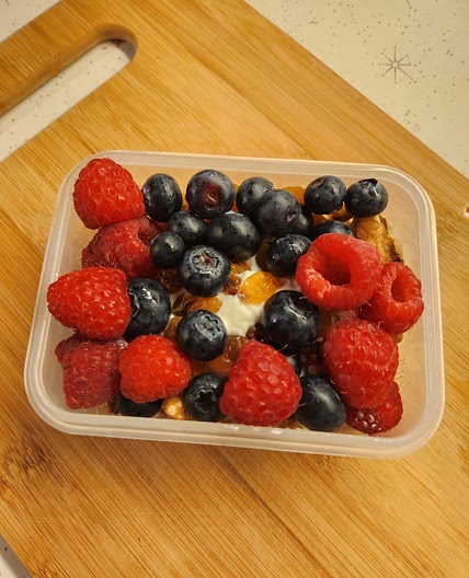 Yogurt with berries and walnuts