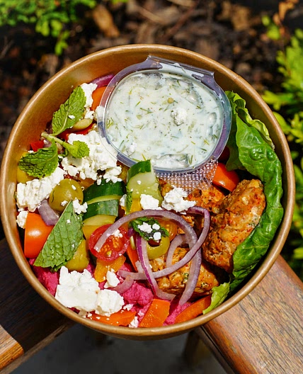 Mediterranean power bowl with chicken and tzatziki sauce