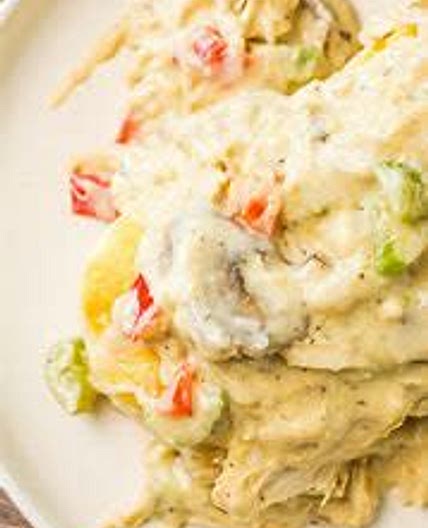 Turkey Ala King Served Over Biscuit