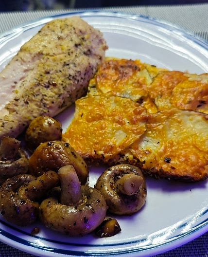 Scalloped Potatoes, chicken & sauteed mushrooms