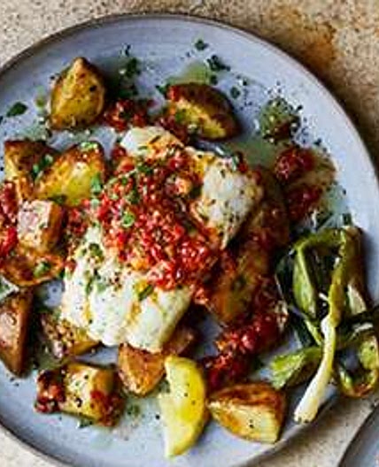 Hake with roast red pepper sauce & charred salad onions