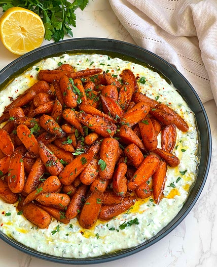 Honey Roasted Carrots Over A Bed Of Citrus Herb Feta Dip 