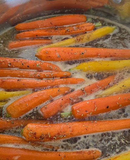 brown sugar-glazed carrots with rosemary and pecans