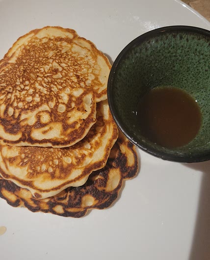 Buttermilk Pancakes with buttery syrup for dipping