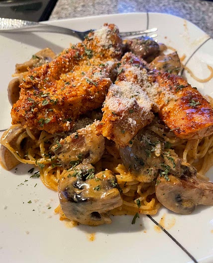 Chicken and mushrooms over pasta 