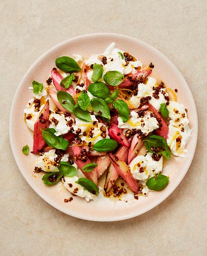 Grilled rhubarb with burrata and pink peppercorn oil