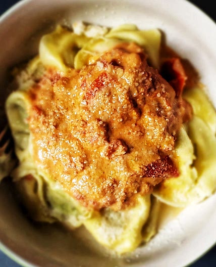 Tortellini with pomodoro cheese sauce